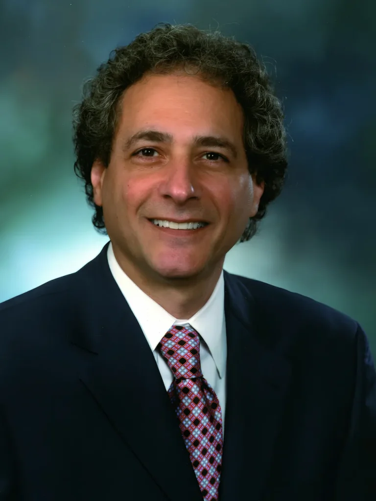 Dr Richard Warshak PhD, psychologist and author of Divorce Poison, wearing a suite and tie, offers professional services